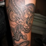 tattoo on the calf dragon - Photo example of the number 20122015 1