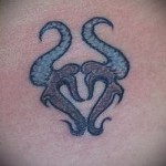 Фото готовой тату знак зодиака телец - необычный цветной рисунок с русалками
