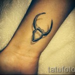 Фото готовой тату знак зодиака телец - оригинальная тату на руку для девушки