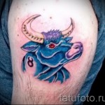 Фото готовой тату знак зодиака телец - синий бык и красные глаза