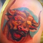 Фото готовой тату знак зодиака телец - цветная татуировка с кроваво красными глазами быка