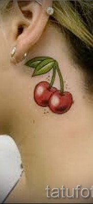 Cherry tattoo on his neck 2