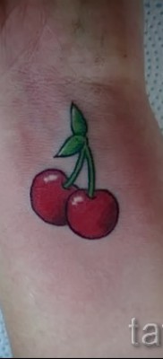 Cherry tattoo on the wrist 1