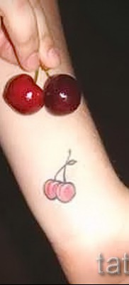 Cherry tattoo on the wrist 2