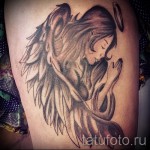 angel tattoo on the thigh 1