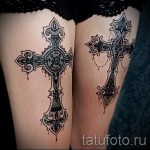 cross tattoo on his thigh 1