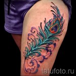 feather tattoo on his thigh girls pictures 2
