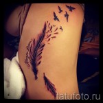 feather tattoo on the ribs - a photo with a tattoo on the example 03022016 2