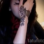 phoenix tattoo on her wrist - a photo of the finished tattoo 11022016 2