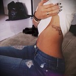 tattoo gun on the ribs - Photo example of a tattoo on 03022016 2