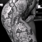 tattoo on his thigh and his side 1