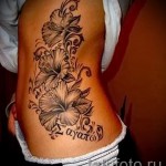 tattoo on the ribs flowers - Photo example of a tattoo on 03022016 2