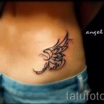 wing tattoo on her hip 1