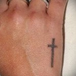 Cross tattoo on the hand - photographs and examples of 01032016 1