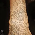 Белая татуировка - необычный узор на кисти руки