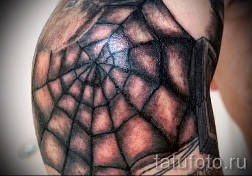 Чёрная паутина на плече тату