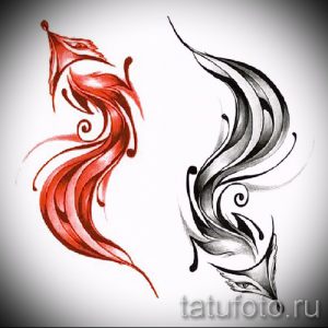 Фото тату с изображением двух стилизованных лис, одна красная, другая черная, выполненных в динамичной, текучей форме.