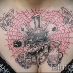 spiderweb tattoo on his chest 1