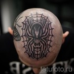 spiderweb tattoo on his head 1