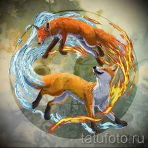 Фото тату лисы, окруженной стихиями огня и воды. Рисунок выполнен в ярких цветах и создает эффект динамики и энергии.