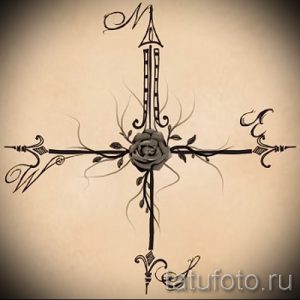 Фото эскиза тату: компас, украшенный розой и витиеватыми линиями, выполненный в черно-белой гамме с акцентом на детали.