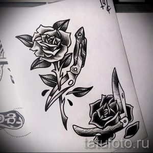 Эскиз татуировки, изображающий розу, пронзенную кинжалом. Символизирует любовь и боль, красоту и опасность. Выполнено в традиционном стиле.