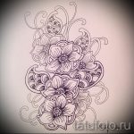 Фото тату: детальный эскиз с абстрактными цветочными узорами, выполненный тонкими линиями. Идеально для женского тела.