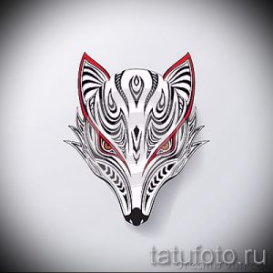Черно-красный эскиз татуировки волка с яркими акцентами. Идеально для тех, кто ценит оригинальность и этнические мотивы.