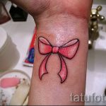 Bogen Tattoo auf ihrem Handgelenk - Foto Beispiel des fertigen Tätowierung 02052016 3