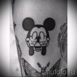 Mickey Mouse tattoo with fuck 1