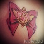 bow tattoo on her collarbone - Photo example of the finished tattoo 02052016 1