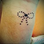 bow tattoo on her wrist - Photo example of the finished tattoo 02052016 2