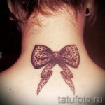 bow tattoo on his neck - Photo example of the finished tattoo 02052016 1