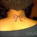 bow tattoo on his neck - Photo example of the finished tattoo 02052016 2
