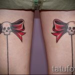 bows tattoo on his feet behind the photo - Photo example of the finished tattoo 02052016 2