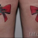 bows tattoo on his feet behind the photo - Photo example of the finished tattoo 02052016 5