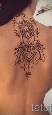 lotus tattoo on the back of value 3