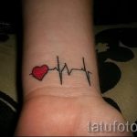 pulse with a heart tattoo - an example of the finished tattoo 1