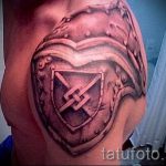 tattoo on his shoulder armor pictures - an example of the finished tattoo 16052016 1