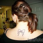 тату бантик на спине - фото пример готовой татуировки 02052016 3