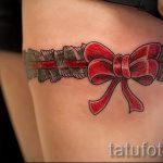 тату бантики на ляшках - фото пример готовой татуировки 02052016 4