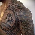 тату на плече мужские кожаные доспехи фото - пример готовой татуировки от 16052016 1