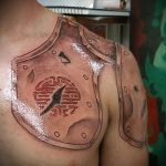 тату на плече мужские кожаные доспехи фото - пример готовой татуировки от 16052016 9