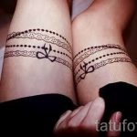 тату подвязка с бантиком на ноге - фото пример готовой татуировки 02052016 12