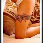 тату подвязка с бантиком на ноге - фото пример готовой татуировки 02052016 14