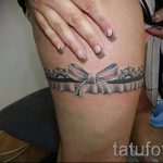 тату подвязка с бантиком на ноге - фото пример готовой татуировки 02052016 15
