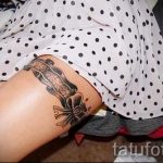 тату подвязка с бантиком на ноге - фото пример готовой татуировки 02052016 17