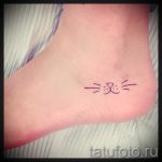 cat tattoo on her ankle - great photo of the finished tattoo 1
