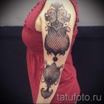 dentelle tatouage sur son bras - par exemple Photo du tatouage fini 1