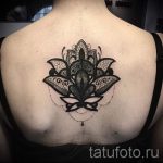 dentelle tatouage sur son dos - par exemple Photo du tatouage fini 1